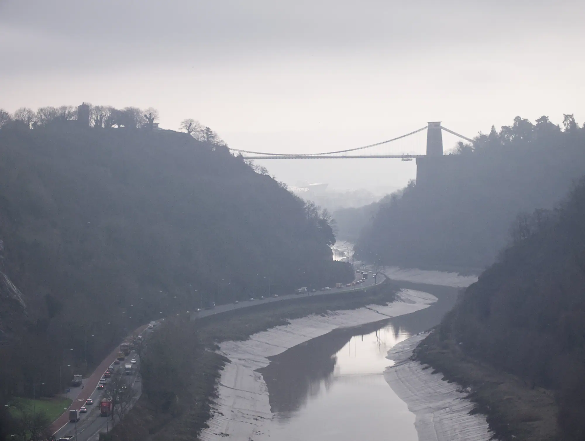Avon Gorge in mist with the Clifton Suspension Bridge above the river