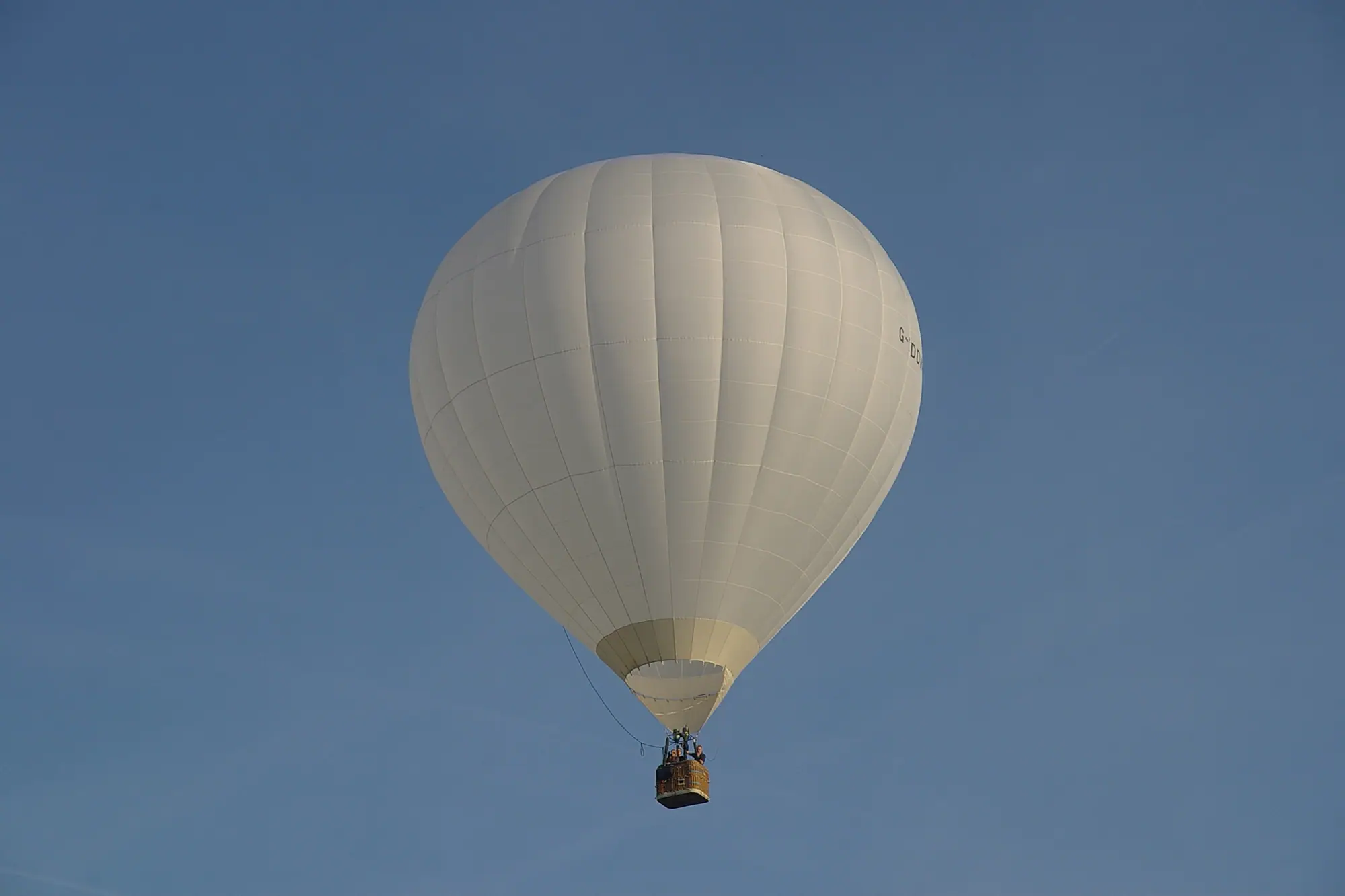 A hot air balloon in the sky above Bristol